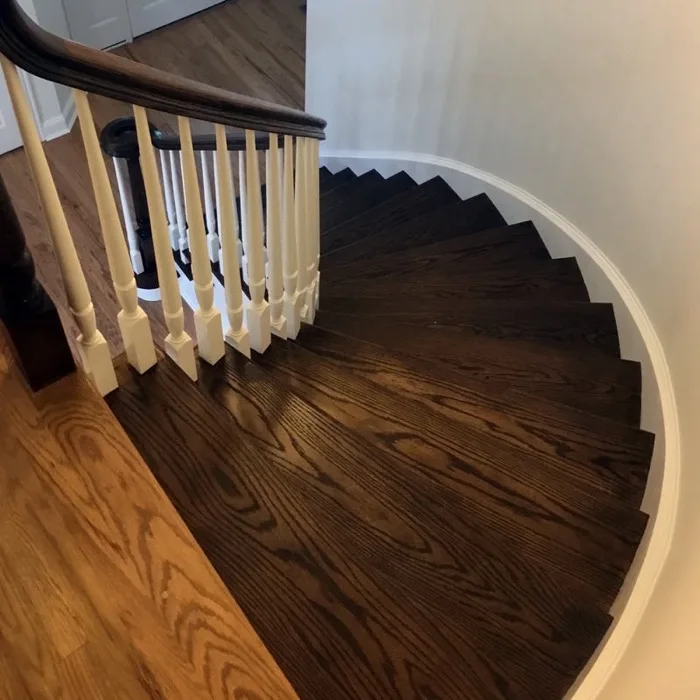 Refinished hardwood floors in a bright living room